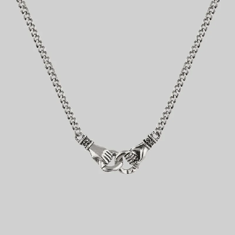 Women’s layered necklaces-UNITY. Linking Hands Necklace - Silver