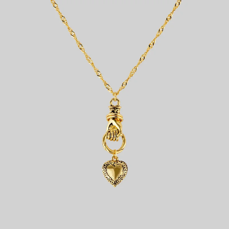 Women’s minimalist necklaces-ALL OF ME. Hand Grasping Heart Necklace - Gold