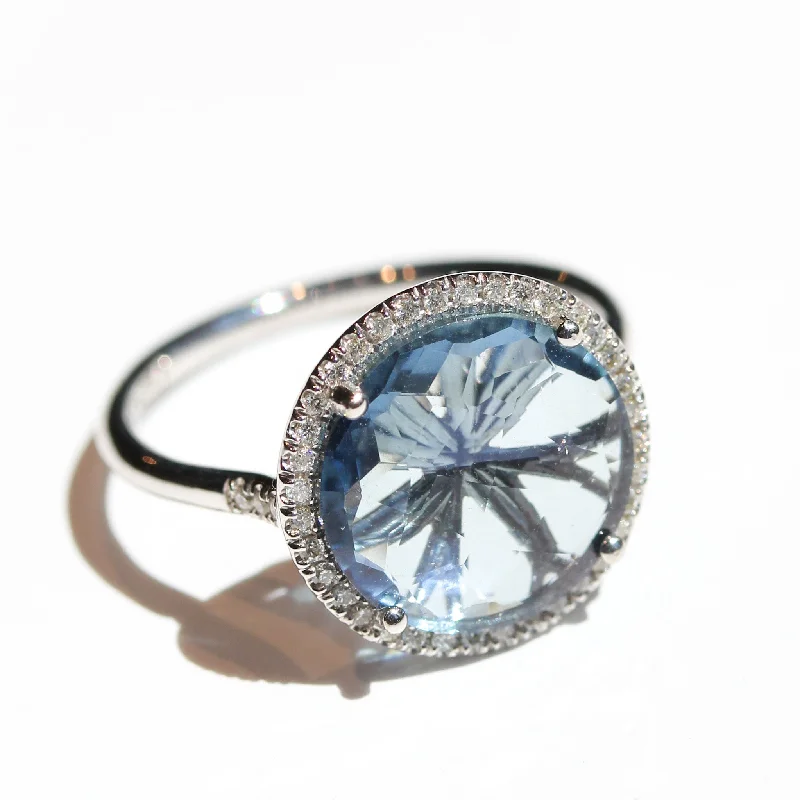 Women’s vintage wedding rings-English Blue Topaz Halo Ring