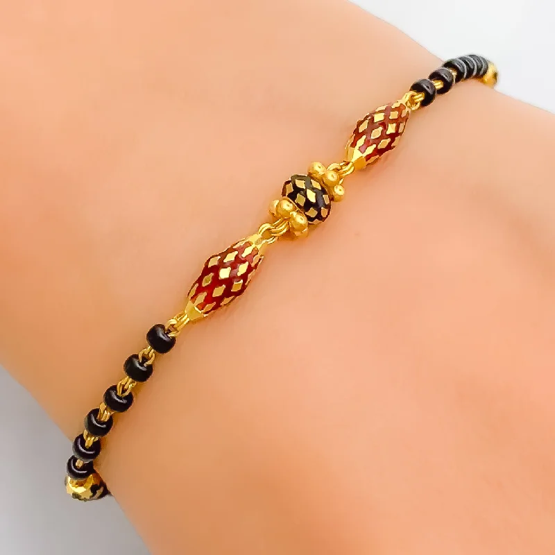 Women’s crystal bangles-Radiant Polished 22k Gold Black Bead Bracelet