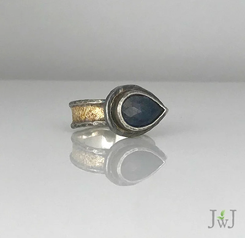 Women’s luxury engagement rings-Pear shaped Blue Sapphire Gold dusted Ring