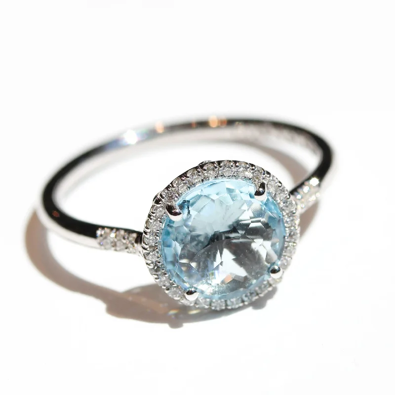 Women’s designer rings for women-Sky Blue Topaz Halo Ring