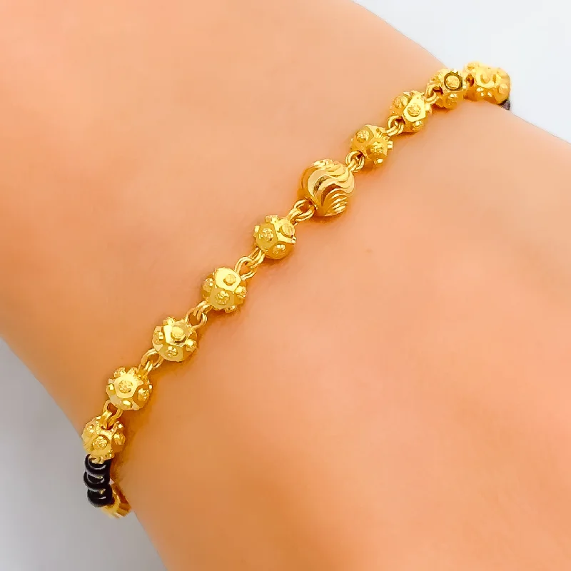 Women’s engraved bangles-Graceful Jazzy 22k Gold Black Bead Bracelet