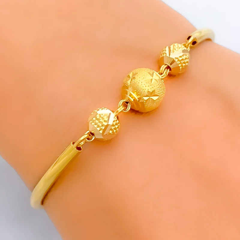 Women’s rose gold bracelets-Shimmering Star 22k Gold Orb Flexi Bangle Bracelet