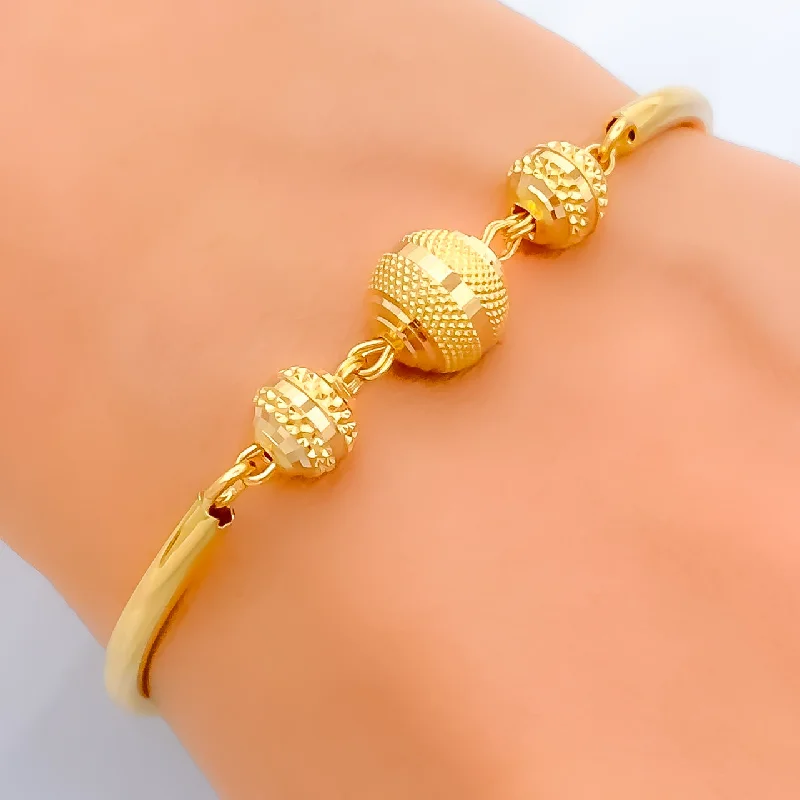 Women’s bracelet and ring sets-Refined Charming 22k Gold Orb Flexi Bangle Bracelet