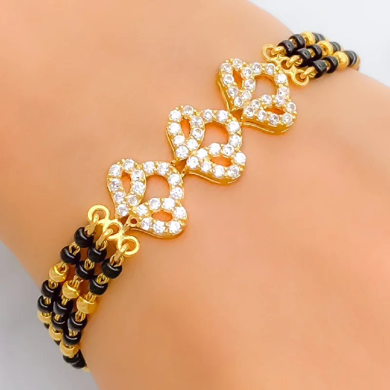 Women’s men’s style bracelets-Sparkling Upscale 22k Gold Black Bead Bracelet