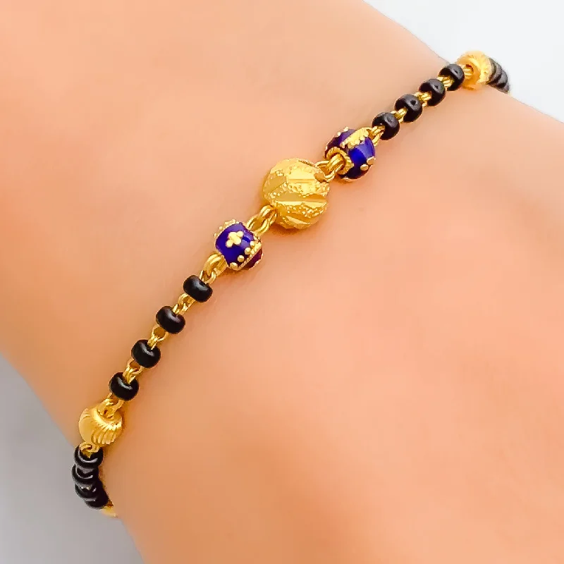 Women’s gold-plated bracelets-Tasteful Fine 22k Gold Black Bead Bracelet